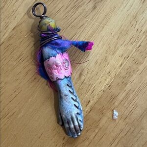 Colorful mystical fortuneteller’s hand pendant